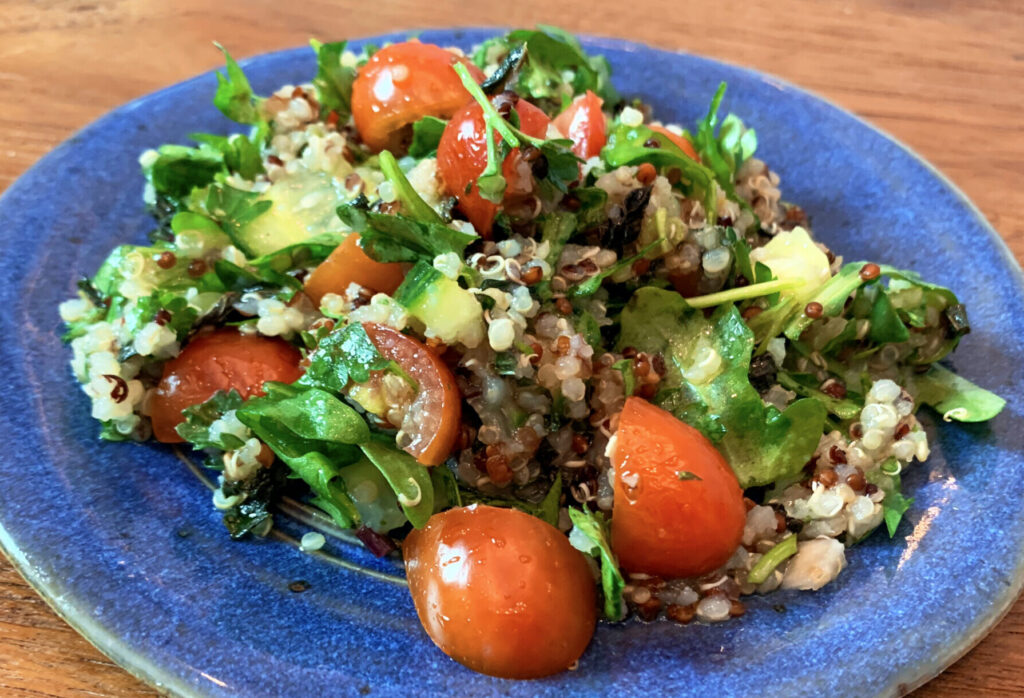KitchAnnette Quinoa Tabbouleh on a blue dish